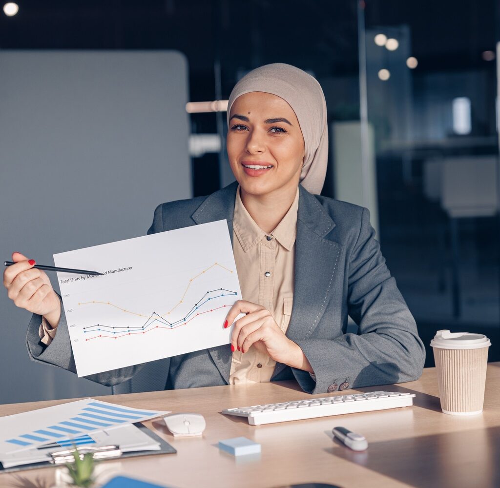 Content Optimization Tips for Maximum Impact Smiling Muslim Businesswoman In Hijab Shows A Grap AMH74W7 1024x1000